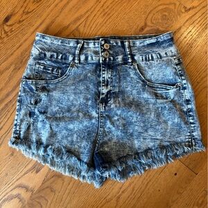 Distressed and frayed Jean shorts